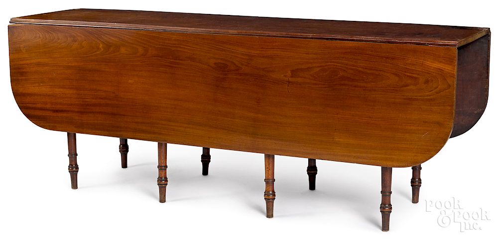 Appraisal: Large Regency mahogany harvest table Exclusive on Bidsquare Large Regency