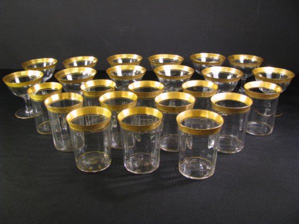 Appraisal: Twenty-four Tiffin glasses with a heavy gold encrusted band etched