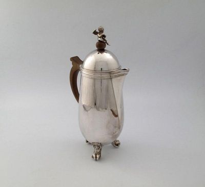 Appraisal: By Leslie Durbin a modern silver hot water chocolate pot