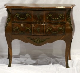 Appraisal: A Louis XV style walnut and inlaid serpentine commode with