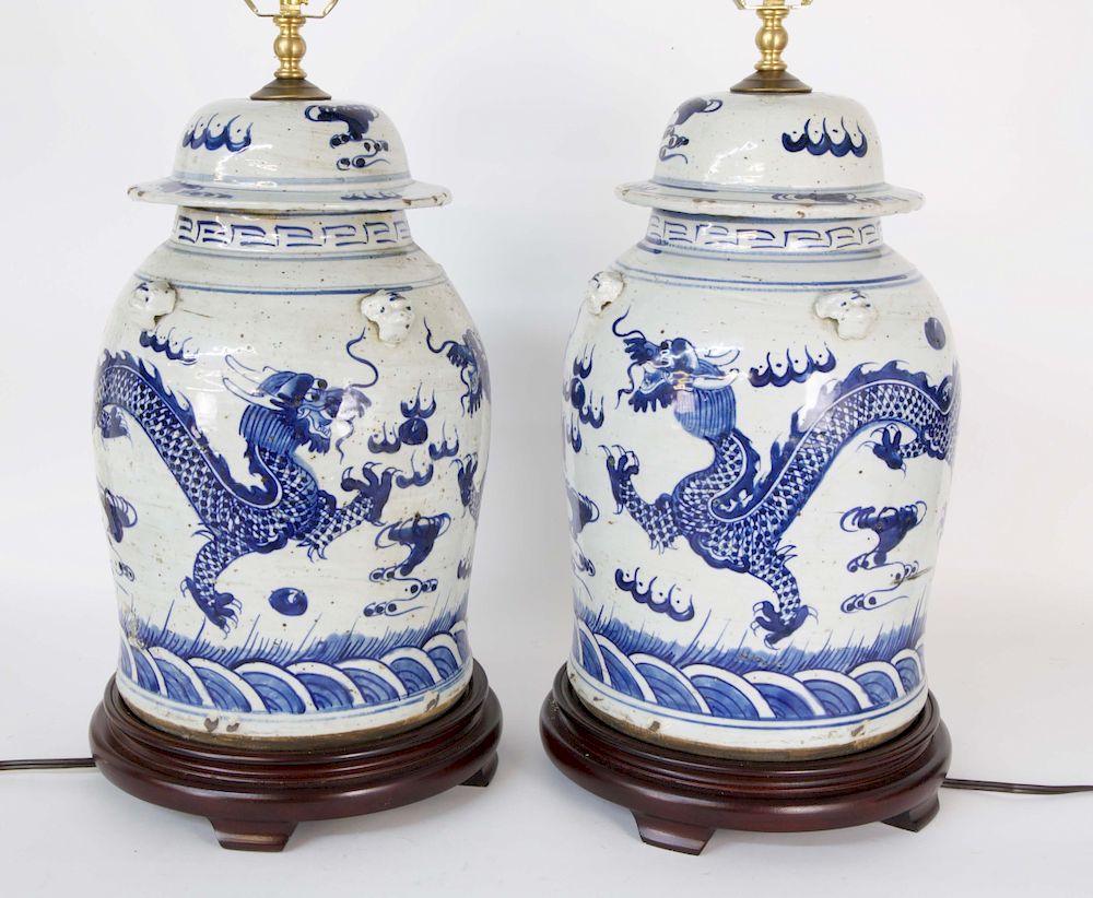 Appraisal: Pair of Chinese Blue and White Covered Temple Jar Lamps