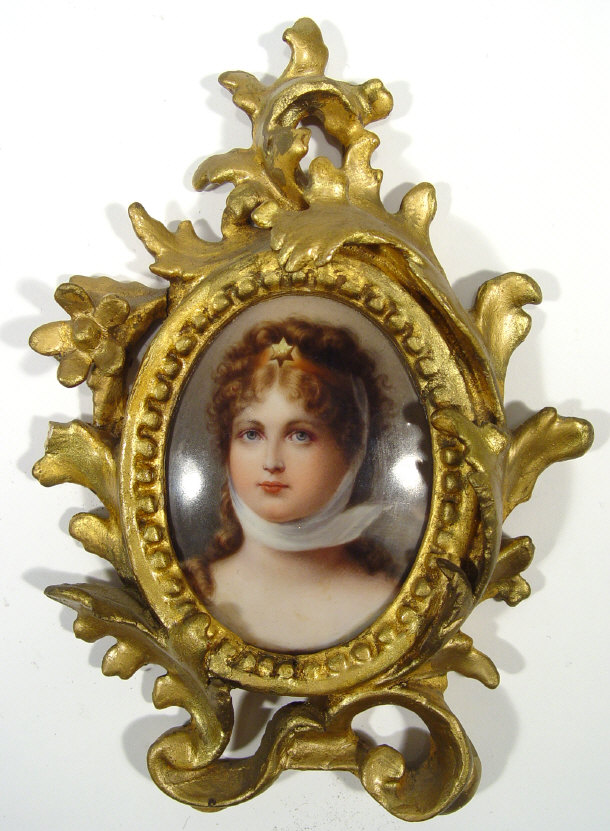 Appraisal: Oval porcelain portrait miniature painted with a young woman in