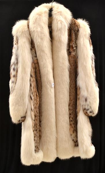 Appraisal: AN ARCTIC FOX AND WILD CAT FUR COAT Labelled '