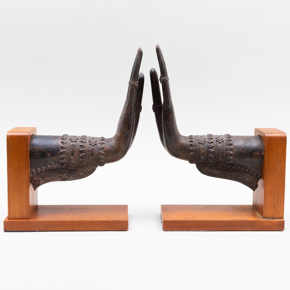 Appraisal: Pair of Thai Bronze Hands Mounted as Bookends x x