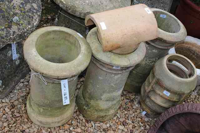 Appraisal: A GROUP OF FIVE OLD TERRACOTTA CHIMNEY POTS with makers