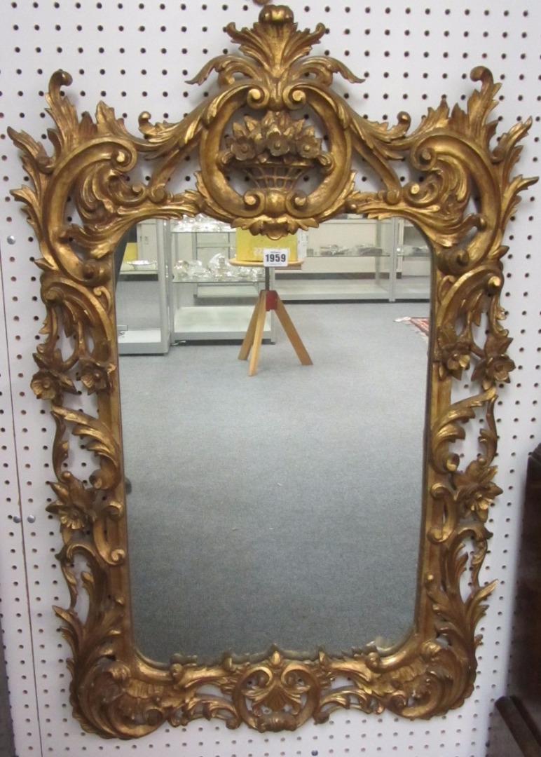 Appraisal: An th century style gilt framed wall mirror with open