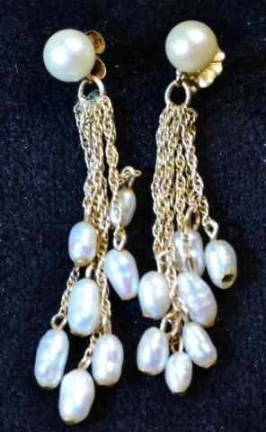 Appraisal: A Pair Of K Freshwater Pearl EarringsA central round pearl