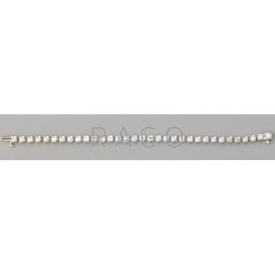 Appraisal: DIAMOND K WHITE GOLD TENNIS BRACELET Thirty-three round brilliant cut