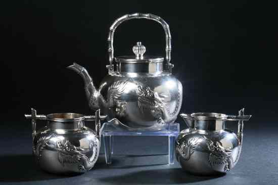 Appraisal: CHINESE SILVER THREE-PIECE TEA SET late th early th century