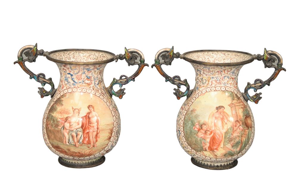 Appraisal: Pair of Viennese Enameled Silver Urns having partially clad figures