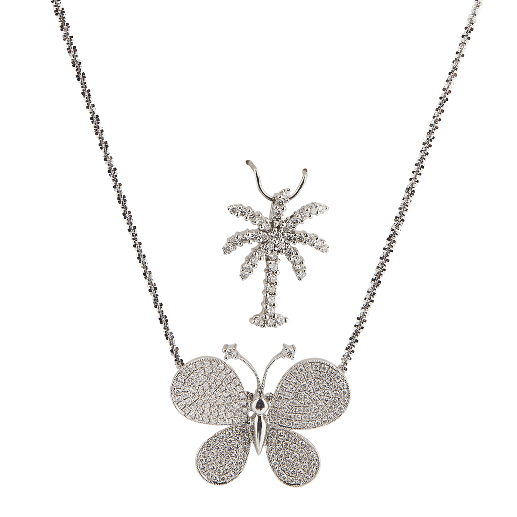 Appraisal: A diamond set pendantmodelled as a butterfly pav set throughout