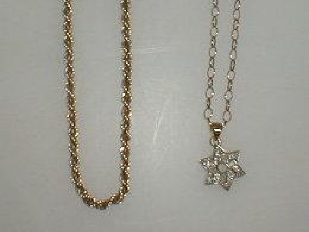 Appraisal: A fine belcher chain with stone set pendant and another