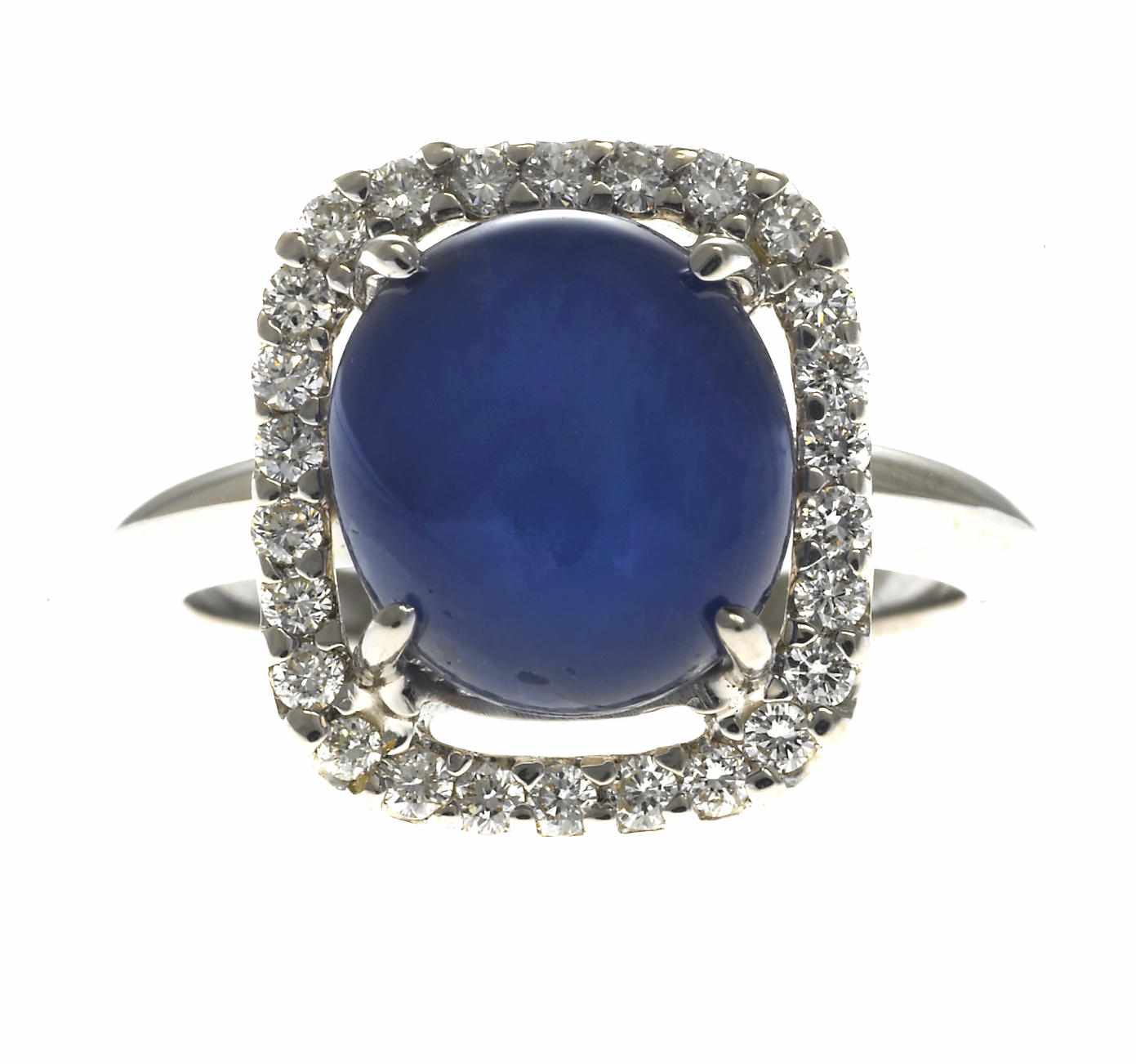 Appraisal: A star sapphire and diamond ring oval-shaped star sapphire measuring