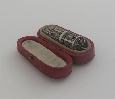 Appraisal: A George III filigree etui with a detachable thimble glass