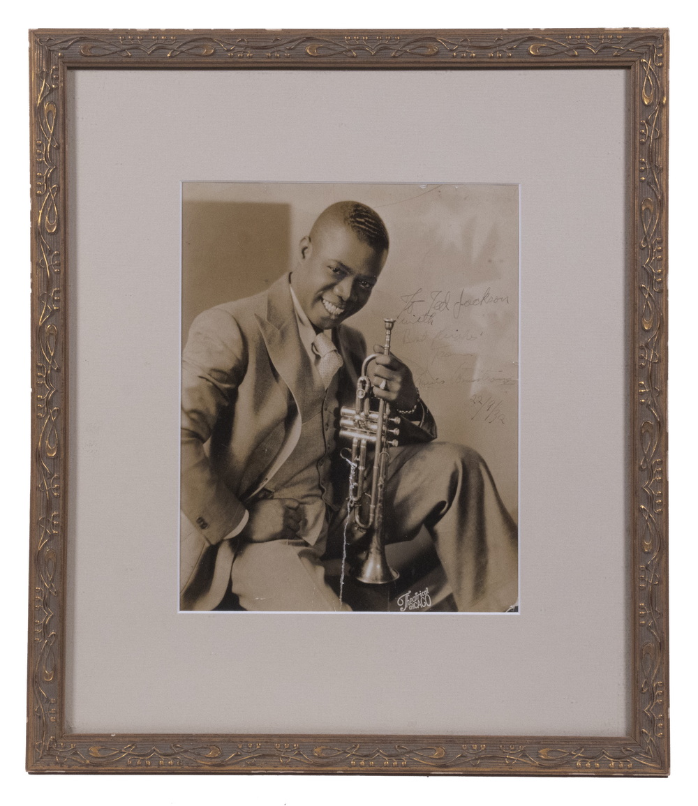 Appraisal: AUTOGRAPHED EARLY LOUIS ARMSTRONG PHOTO FRAMED Sepia toned original photograph