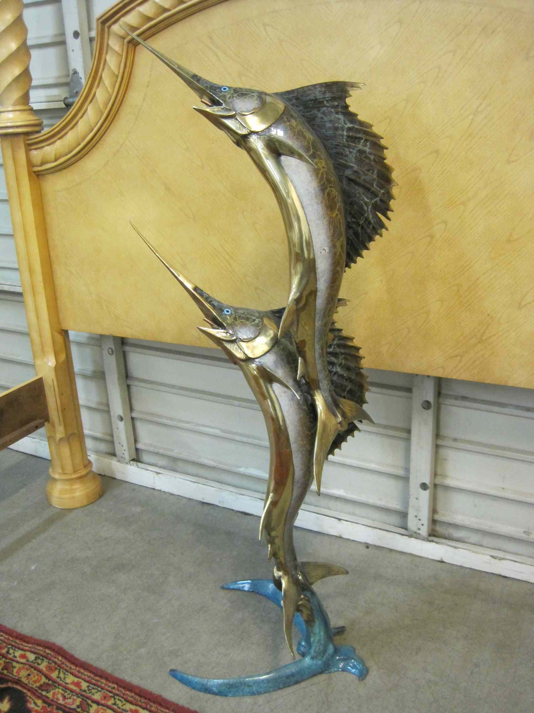 Appraisal: MARINE WILDLIFE BRONZE FOUNTAIN SCULPTURE a pair of polychromed breaching