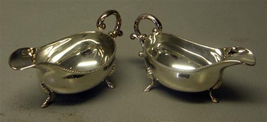 Appraisal: Pair of modern silver sauce boats with gadrooned rims 'C'