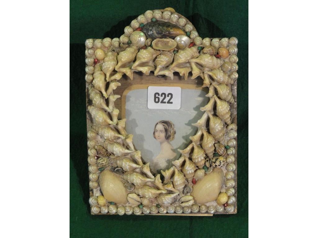 Appraisal: A Victorian shell encrusted photo frame with a heart shaped