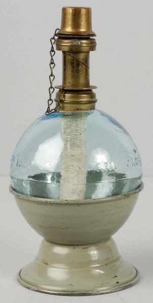 Appraisal: Early Whale Oil Lamp Description Dated Glass globe metal bottom