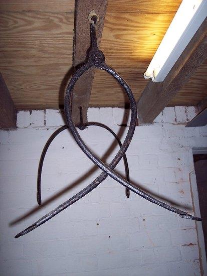 Appraisal: Two pairs of hanging meat hooks etc