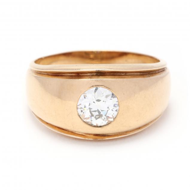 Appraisal: Gent's Gold and Diamond Ring The wide tapered band centered