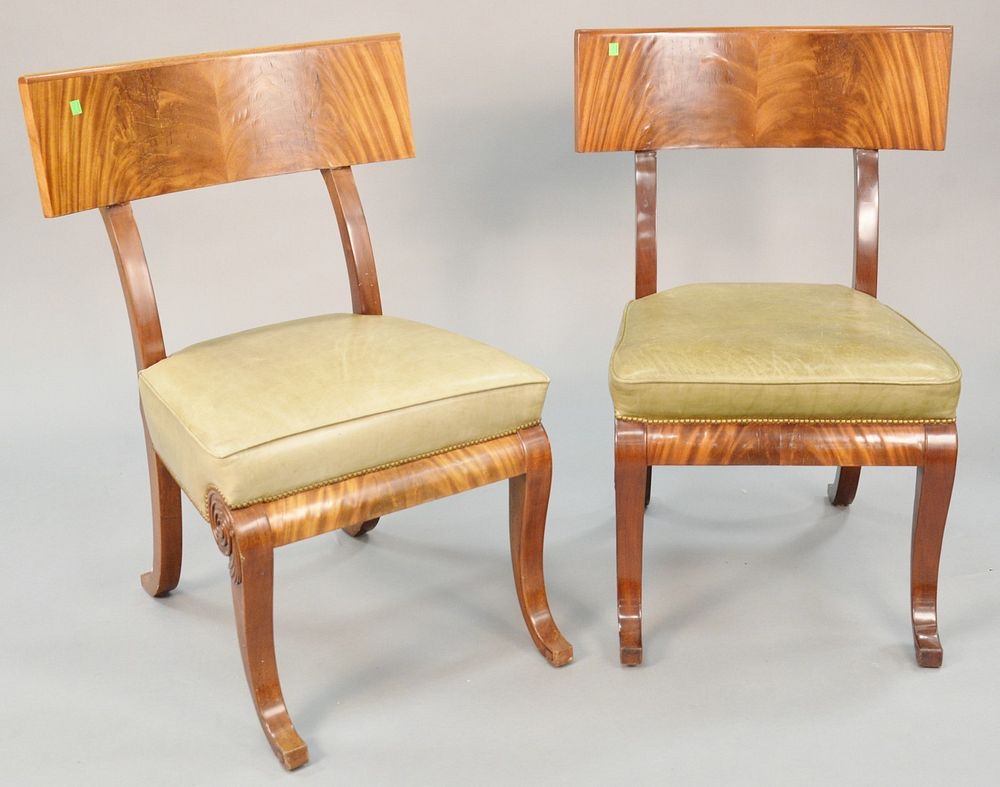 Appraisal: Pair th C chairs with green leather seats scrolled legs