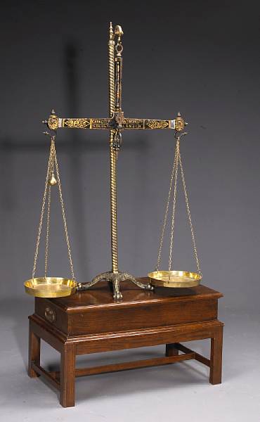 Appraisal: A pair of Victorian brass scales scales second half th