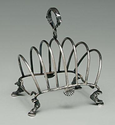 Appraisal: Tiffany sterling toast rack seven loop partitions with central vine