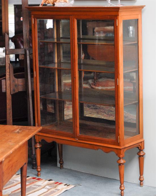 Appraisal: A Cherry China Cabinet having a molded cornice over two