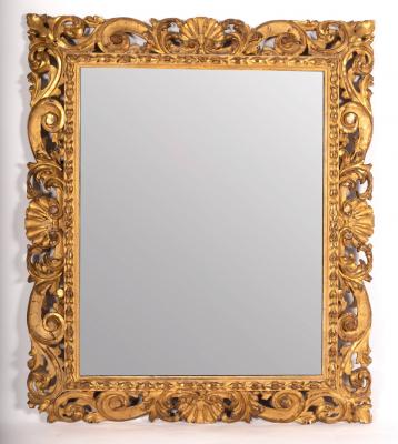 Appraisal: A carved and gilded frame with pierced decoration of leaf