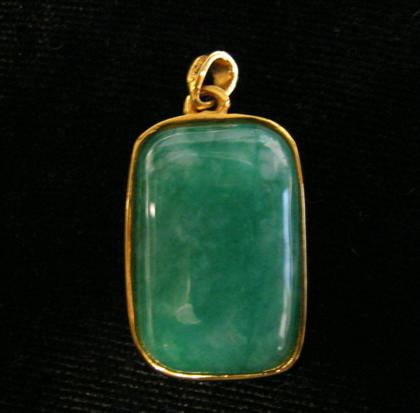 Appraisal: karat jade pendantReverse side accented by gold dragon design