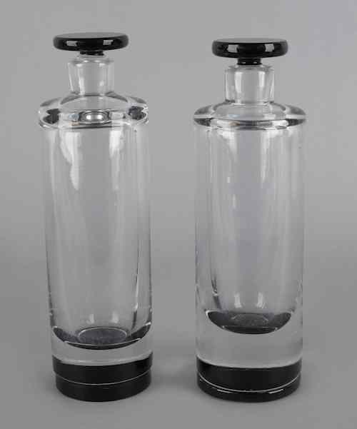 Appraisal: Pair of Orrefors colorless and smoky glass bottles signed on