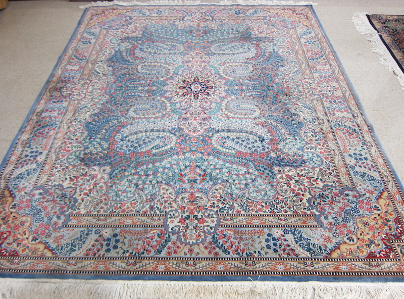 Appraisal: HAND KNOTTED ORIENTAL CARPET Indo-Kerman floral and central floral medallion