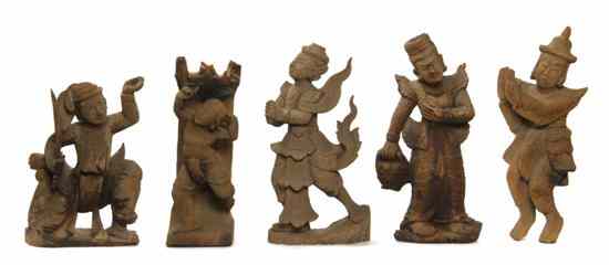 Appraisal: A Group of Five Southeast Asian Carved Wood Figures each