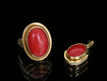 Appraisal: A Coral Ring and Pendant Set in Gold The lot