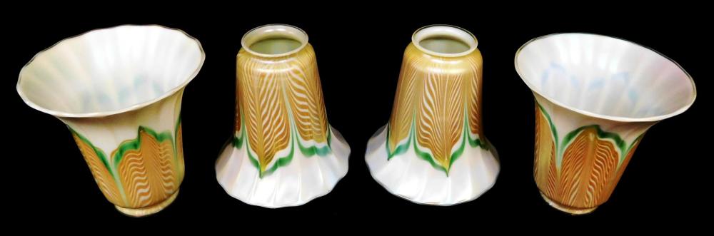 Appraisal: ART GLASS Four iridescent art glass shades American early th