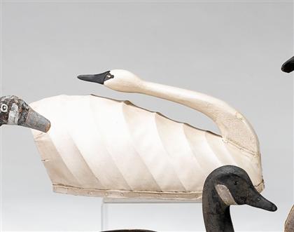 Appraisal: Carved and painted canvas-backed swan decoy th century In sleeping