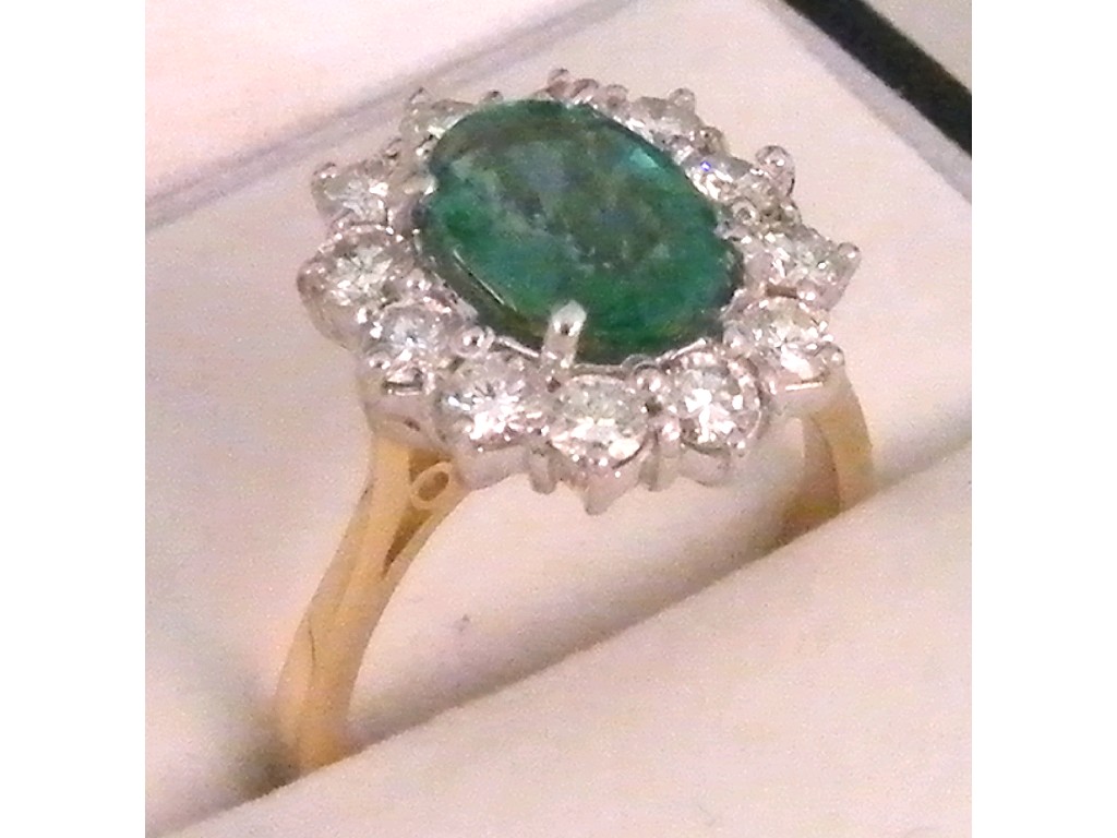 Appraisal: Good size ct oval emerald and diamond cluster ring the