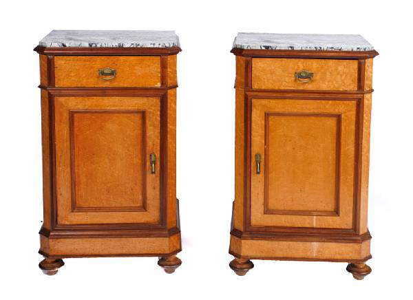 Appraisal: A pair of French bird's eye maple cupboards height in