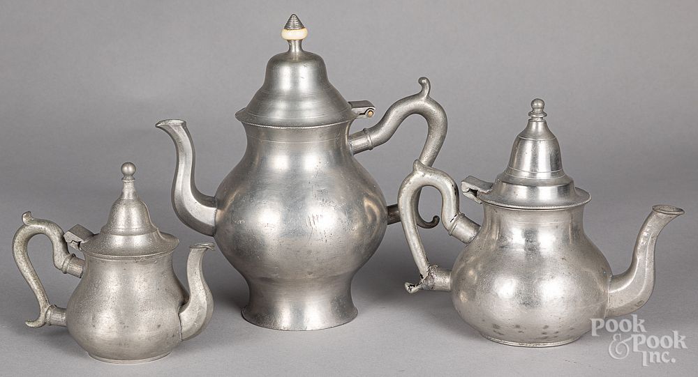 Appraisal: Three pewter teapots th th c Three pewter teapots th