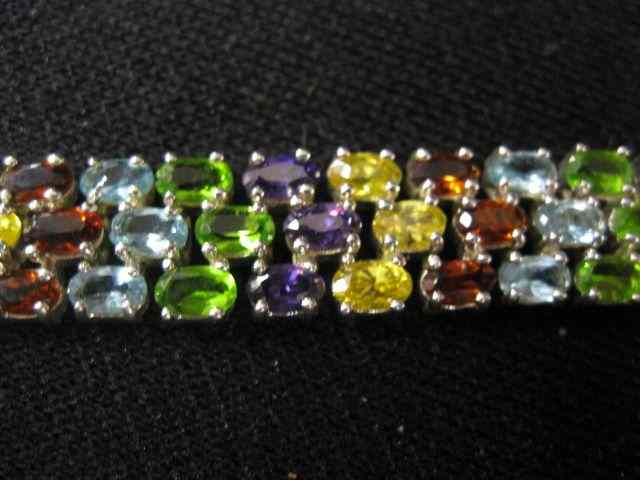 Appraisal: Gemstone Bracelet oval gems including garnet peridot blue topaz citrine