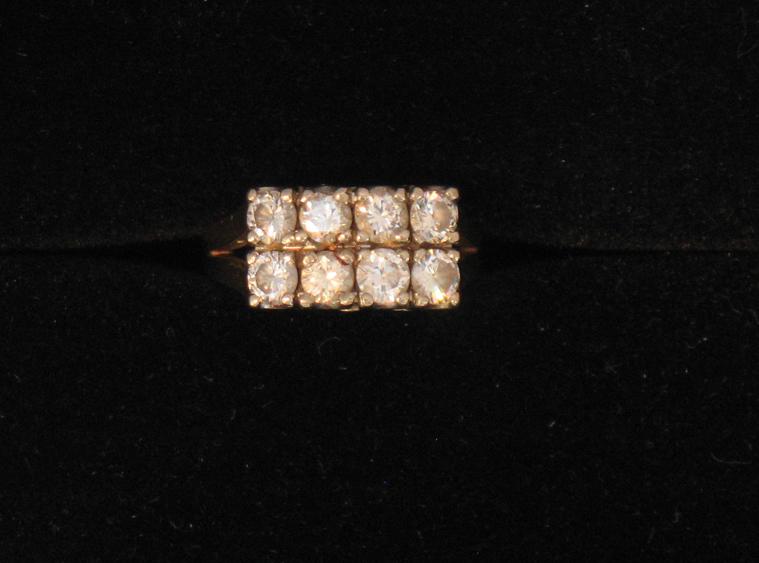 Appraisal: A DOUBLE ROW DIAMOND DRESS RING the two rows of