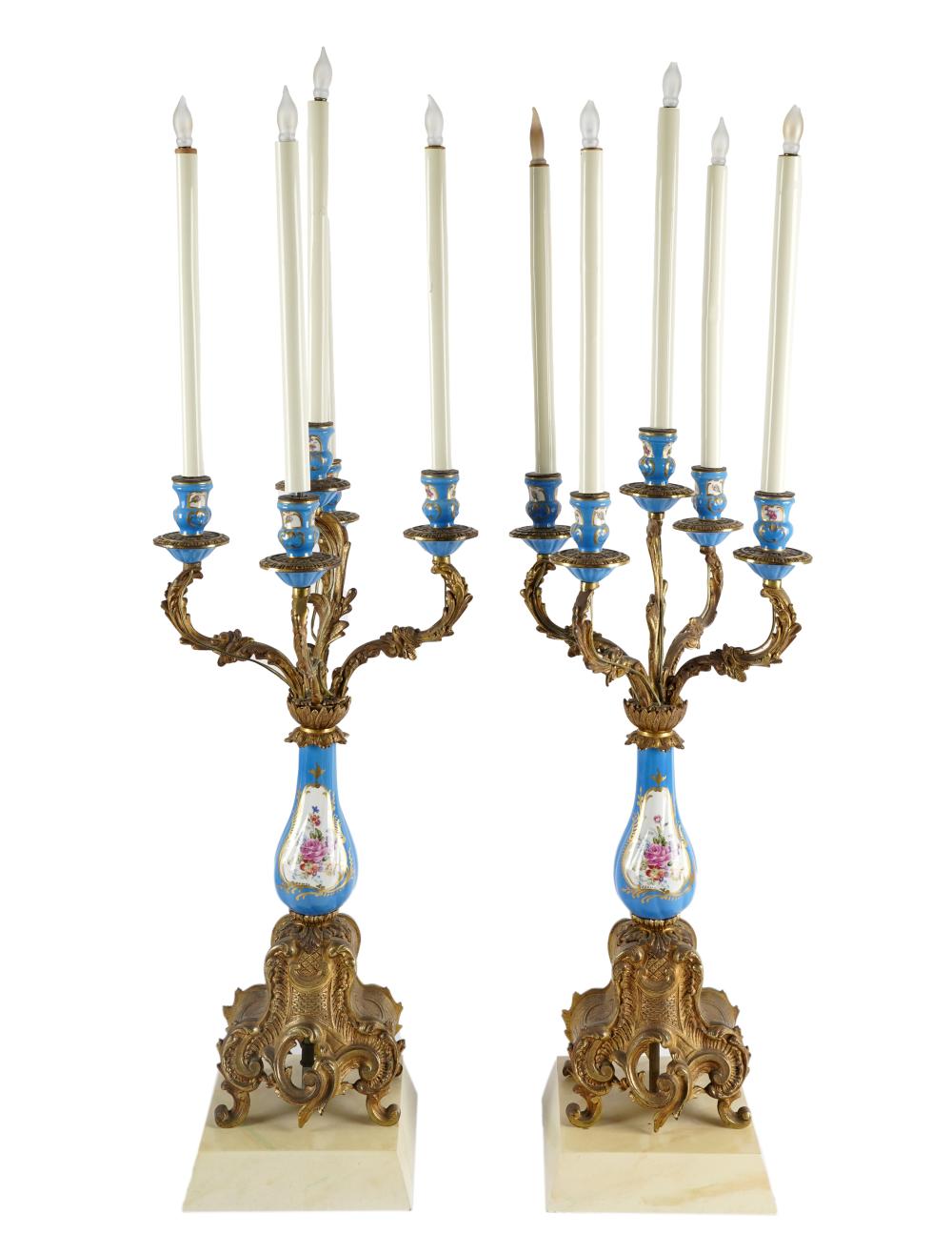 Appraisal: PAIR OF SEVRES-STYLE GILT METAL-MOUNTED CANDELABRAon wooden bases each with