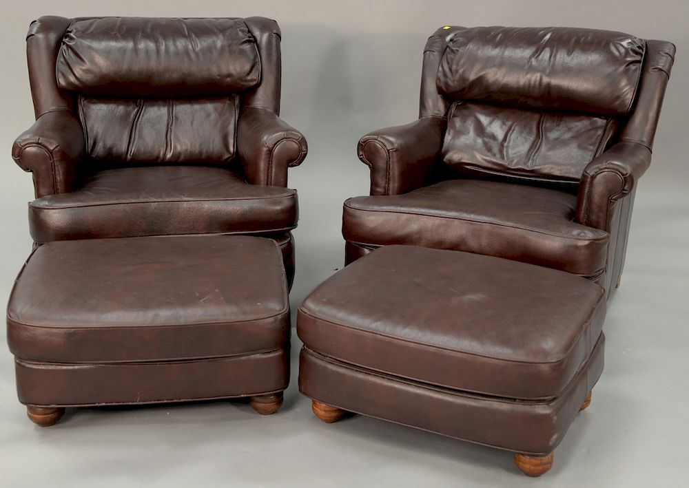 Appraisal: Pair of Sam Moore leather easy chairs and ottomans Pair