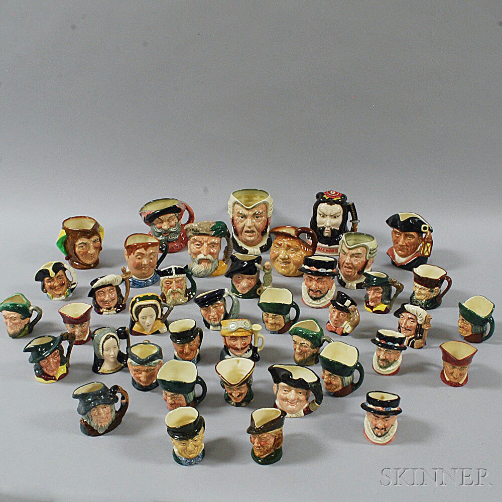 Appraisal: Forty Doulton Face Jugs including Buzz Fuzz a small Samurai