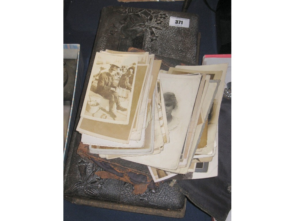 Appraisal: Lot comprising album of photographs and a pouch of postcards