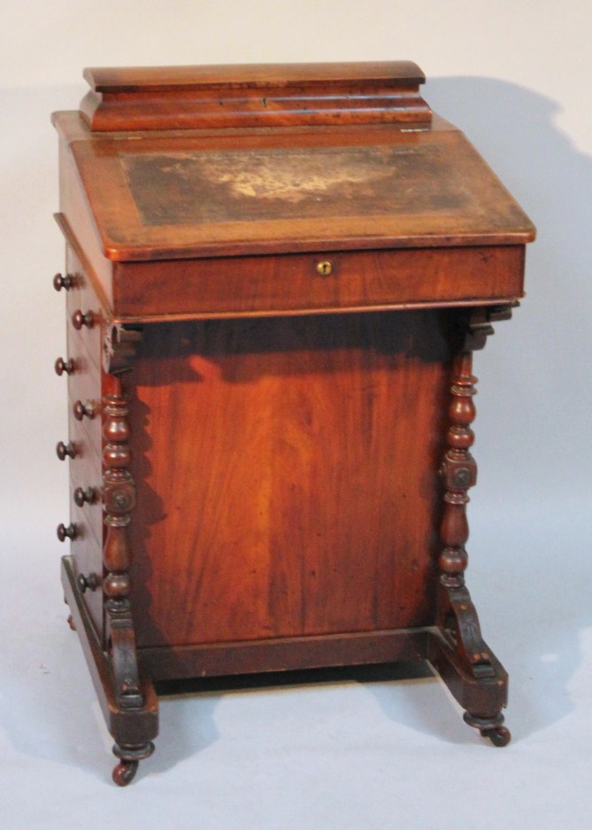 Appraisal: A Victorian mahogany Davenport desk with hinged lid to the