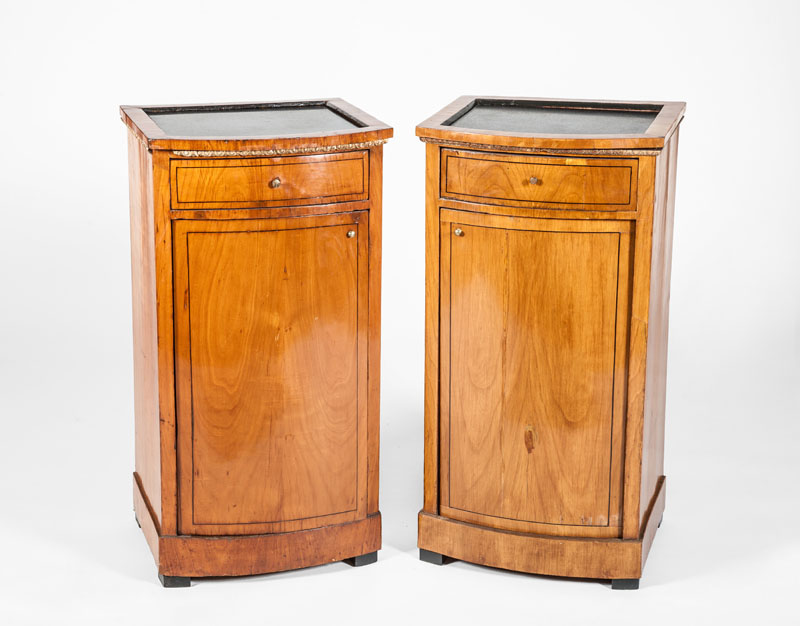 Appraisal: PAIR OF BIEDERMEIER CHERRY AND PARCEL-GILT PEDESTAL CABINETS Each with