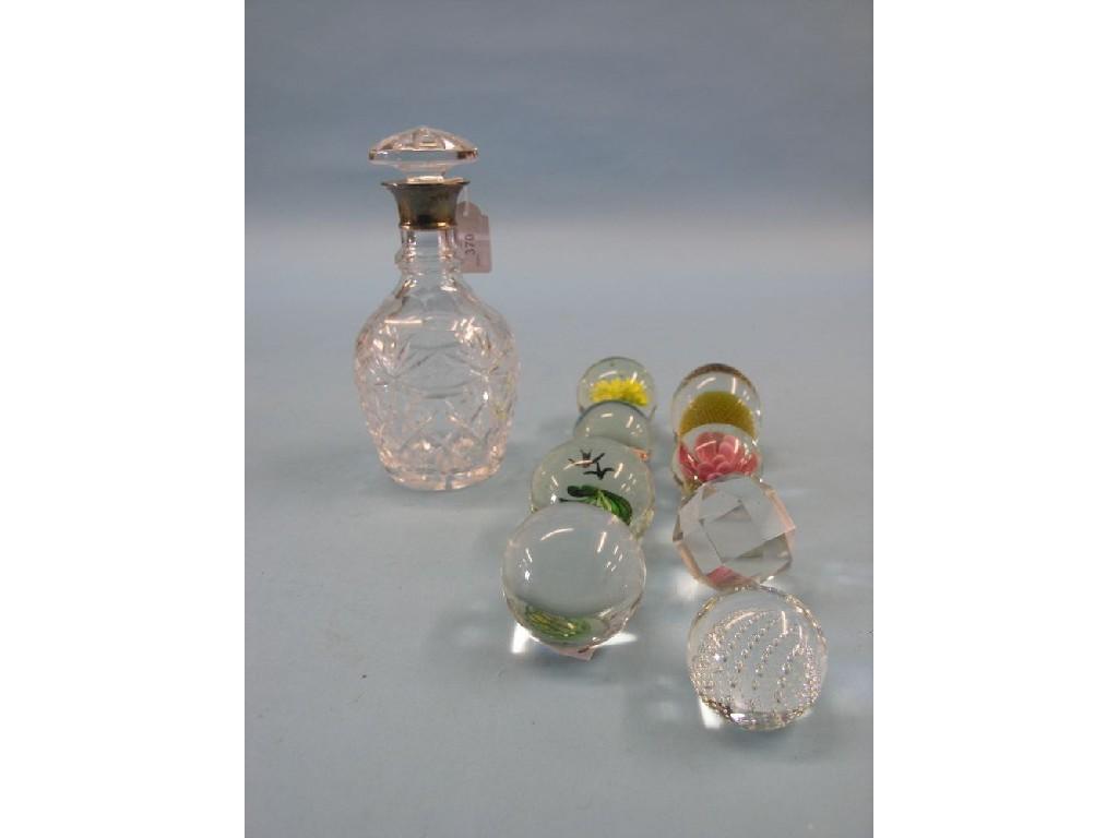 Appraisal: A silver mounted glass decanter with stopper eight various glass