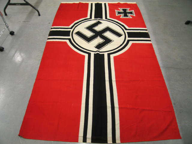 Appraisal: World War II German Nazi Banner hung from a building